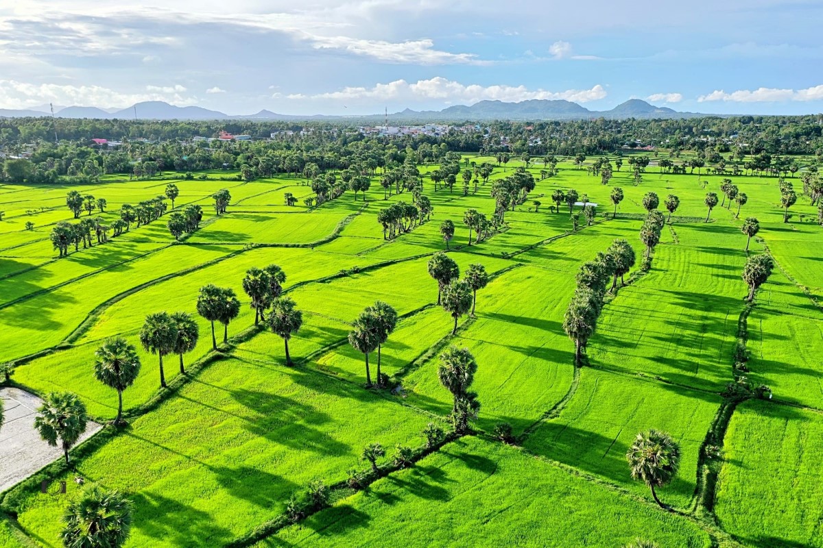 Ba Ra Mountain, sacred to Stieng people in Binh Phuoc, with stunning green landscapes.