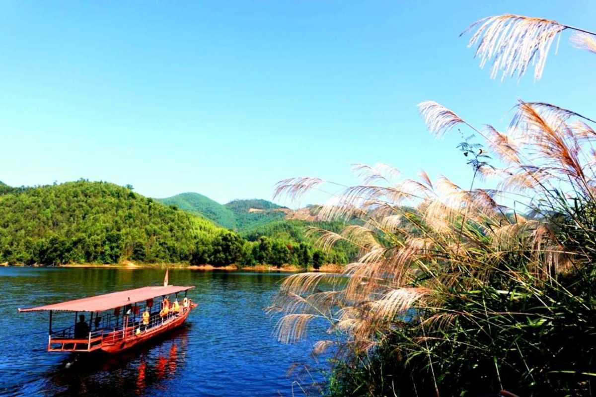 Bac Giang Travel Mountain Village Temple Amidst Green Forest Bac Giang Travel features a mountain village temple nestled in dense green forest with stone pathways