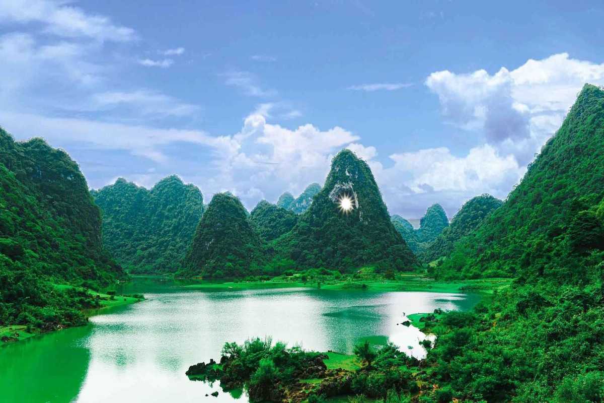 Cao Bang Travel Guide Scenic River Valley Scenic river valley winding through lush greenery and karst formations in Cao Bang