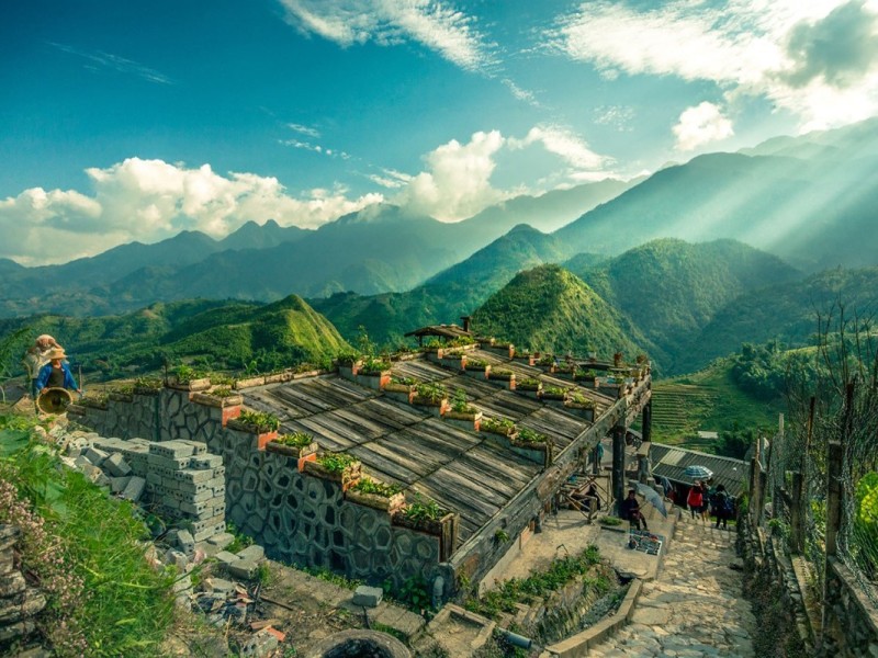 Cat Cat Village in Sa Pa with lush green mountains in the background