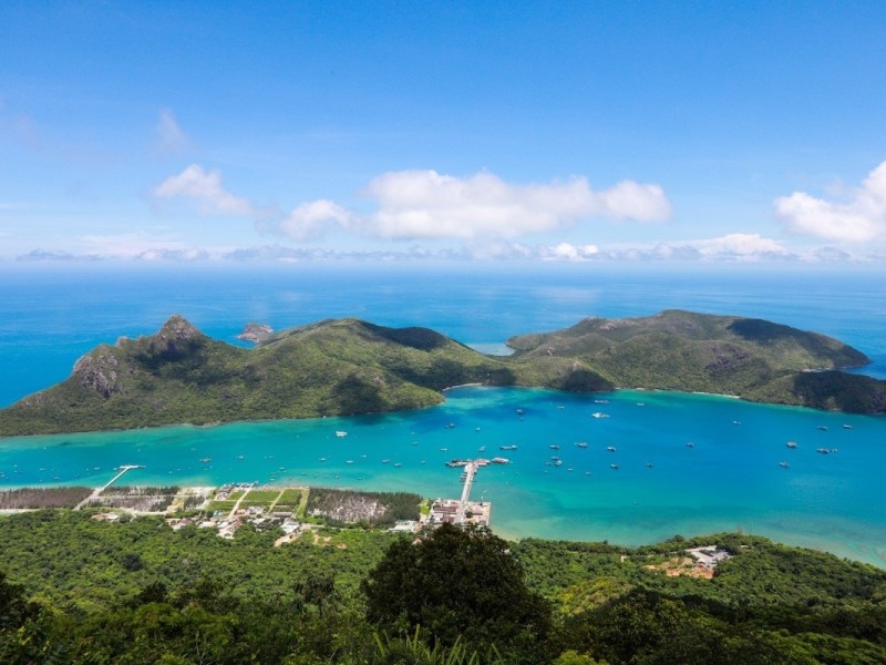 Scenic view of Con Dao Islands with lush green mountains and crystal-clear waters