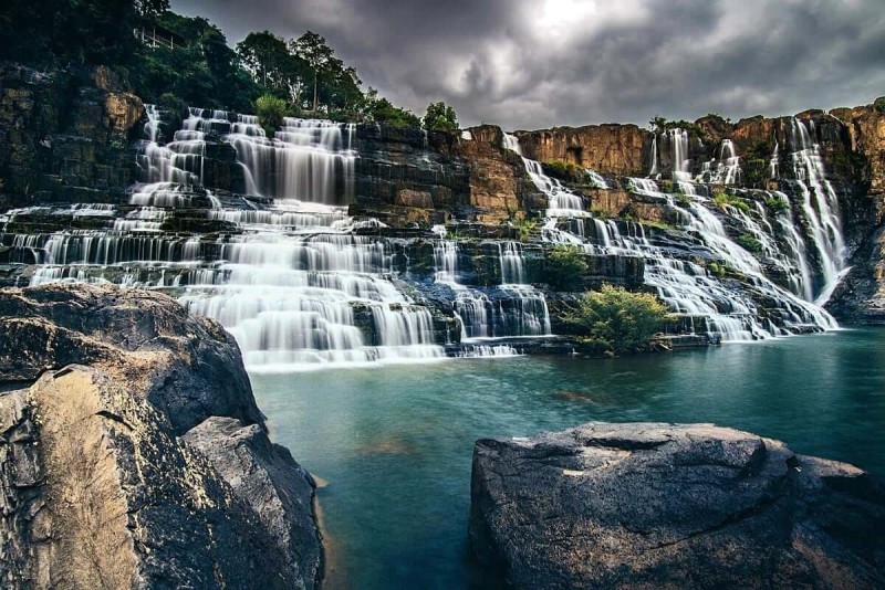 Majestic waterfall in Da Lat, Vietnam with cascading water and scenic rock formations