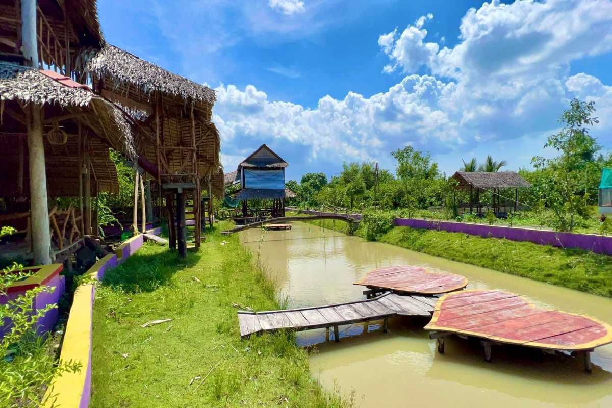 Dong Thap Travel Guide Riverside Homestay Accommodation Riverside homestay accommodation in Dong Thap with traditional wooden stilt houses and canals