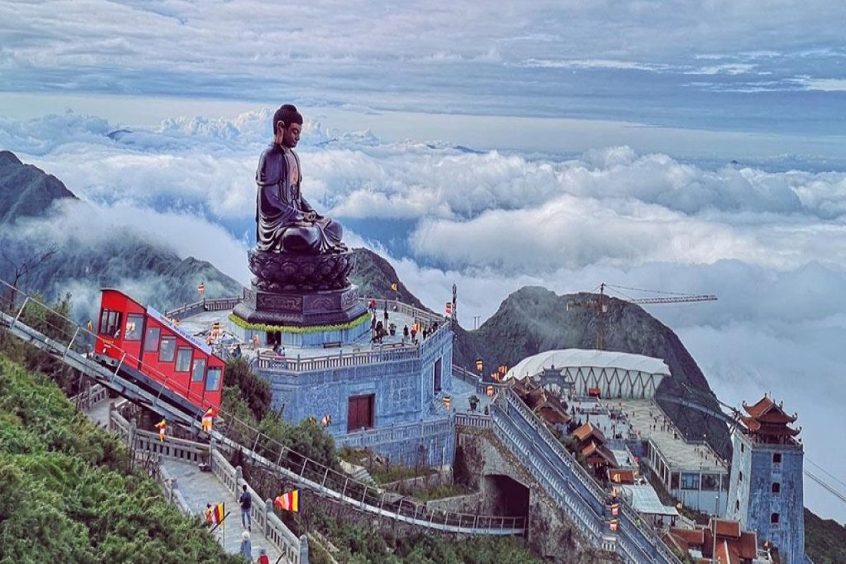 View of Fansipan Peak, known as the Roof of Indochina, overlooking Sa Pa highlands with breathtaking misty landscape