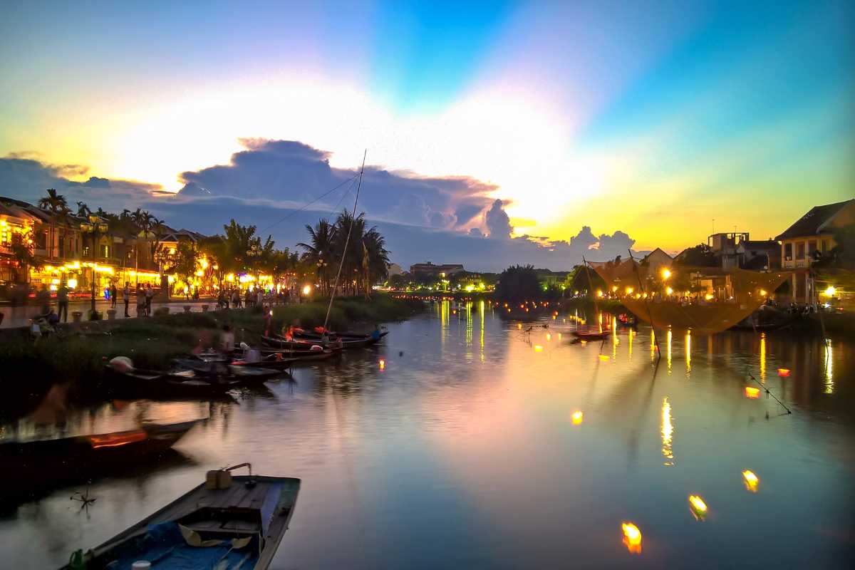 Evening Crowd at Hoi An Ancient Town Bridge Crowd gathering on the historic bridge over the river lit up with lanterns