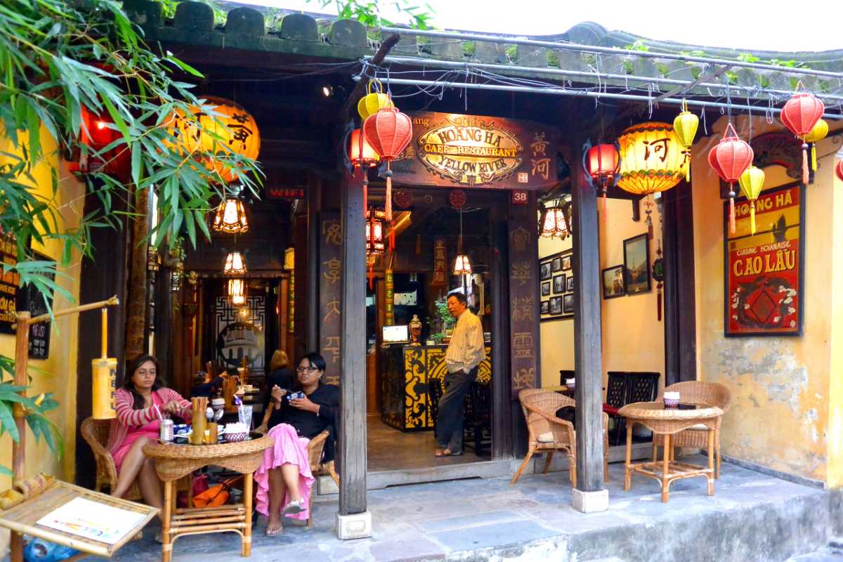 View of Hoi An Ancient Town Streets from Above Elevated view of Hoi An’s traditional houses and streets bustling with locals and visitors