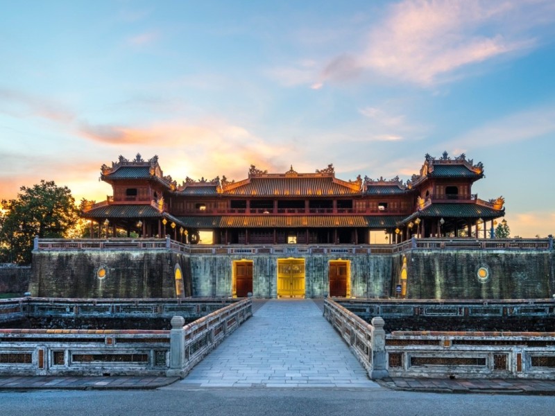 A breathtaking view of the Hue Imperial Citadel at sunset, highlighting its ancient architecture and historical significance.