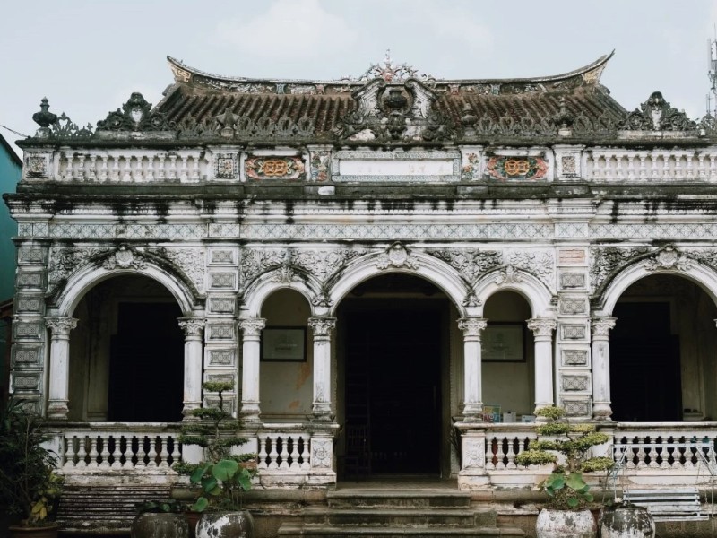 Detailed architectural features of Huynh Thuy Le Ancient House in Dong Thap province, Vietnam.