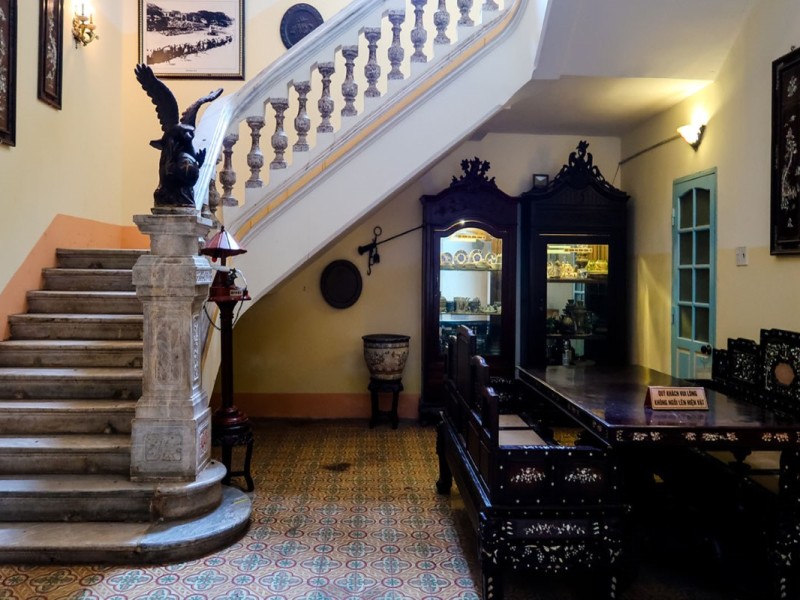 Interior of Cong Tu Bac Lieu House featuring vintage furnishings