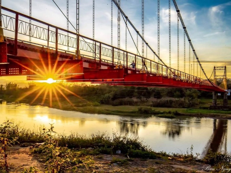 Beautiful sunset at Kon K'lor Suspension Bridge in Kon Tum, Vietnam