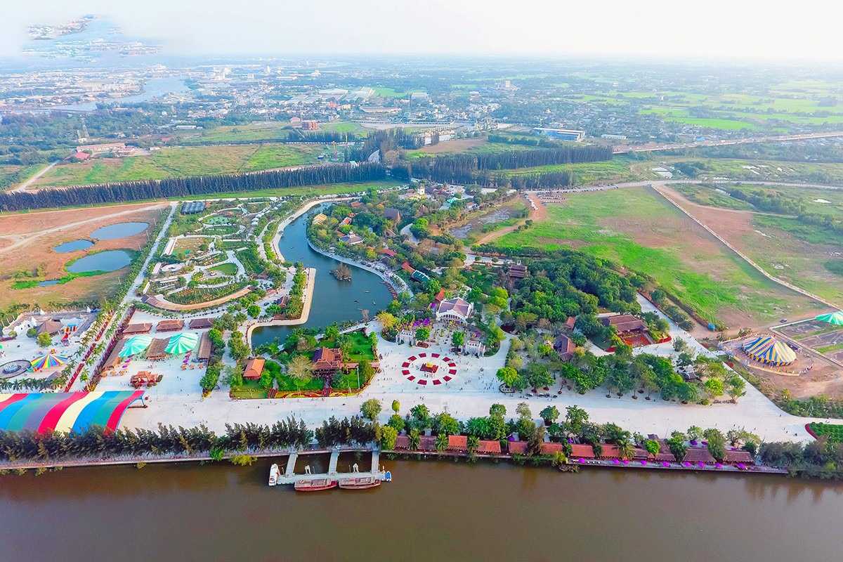 Long An Travel Guide aerial view of amusement park Colorful amusement park with rides, gardens, and walking paths in Long An Travel Guide