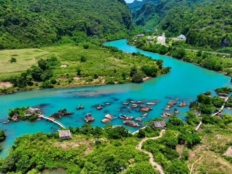 Beautiful blue waters of Mooc Spring in the jungle of Quang Binh