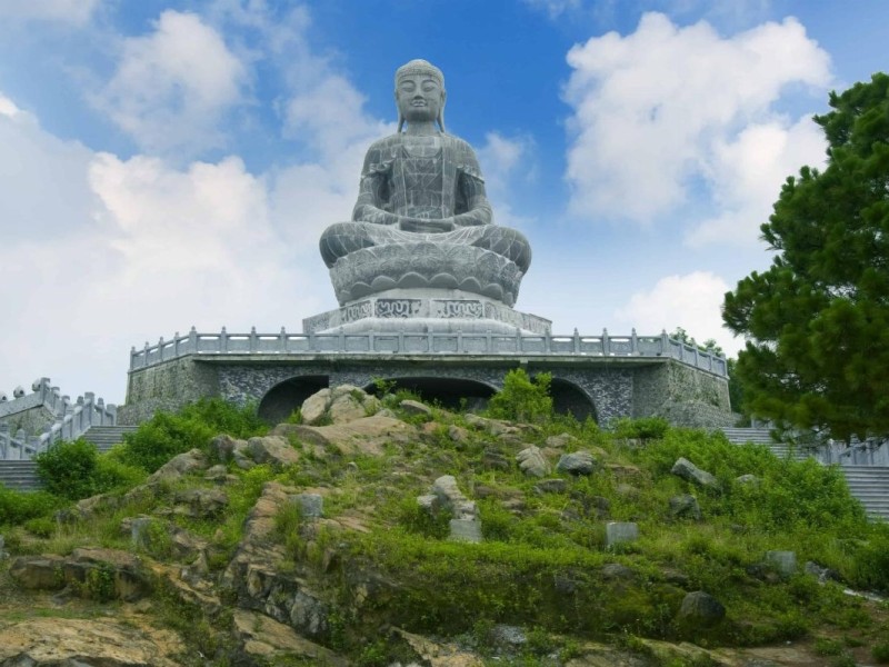 Phat Tich Pagoda in Bac Ninh, featuring a large stone Buddha statue