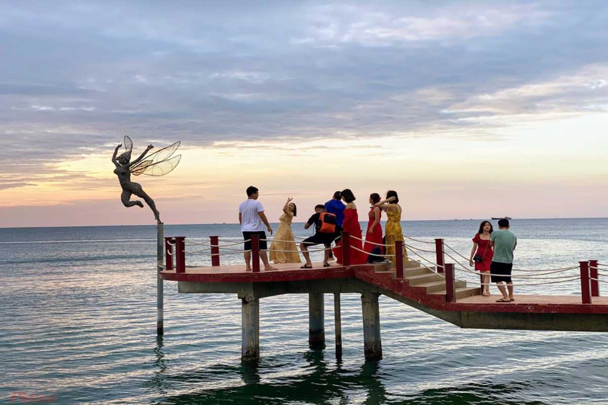 Phu Quoc Travel Guide Scenic Bay with Numerous Fishing Boats Phu Quoc Travel Guide scenic bay filled with traditional fishing boats floating on clear blue waters
