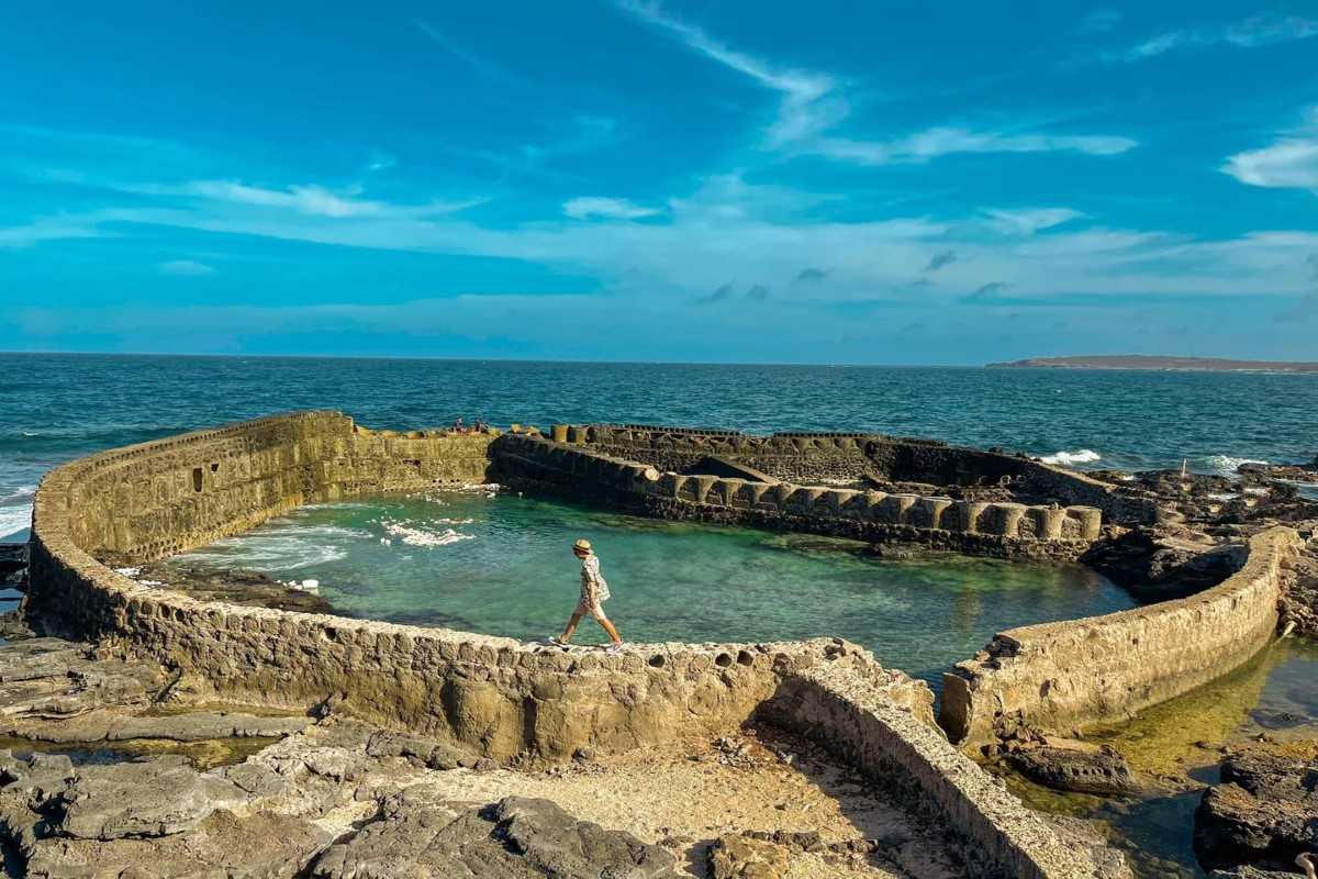 Phu Quy Island Scenic View Scenic view of Phu Quy Island with its rocky coastline and clear waters in Binh Thuan