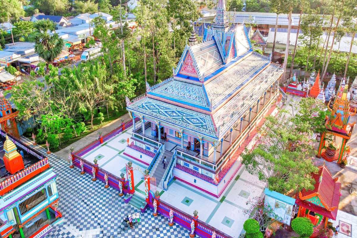 Soc Trang Bat Pagoda Khmer Temple Architecture Soc Trang Bat Pagoda showcases intricate Khmer-style temple architecture surrounded by lush greenery in Vietnam’s Mekong Delta.