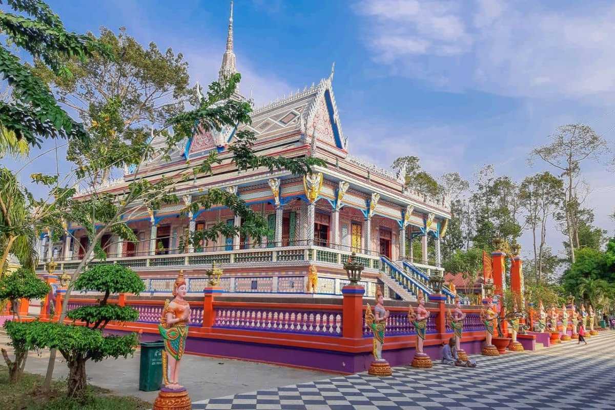 Soc Trang Som Rong Pagoda Reclining Buddha Statue Soc Trang Som Rong Pagoda features the largest reclining Buddha statue in Vietnam with ornate Khmer design elements.