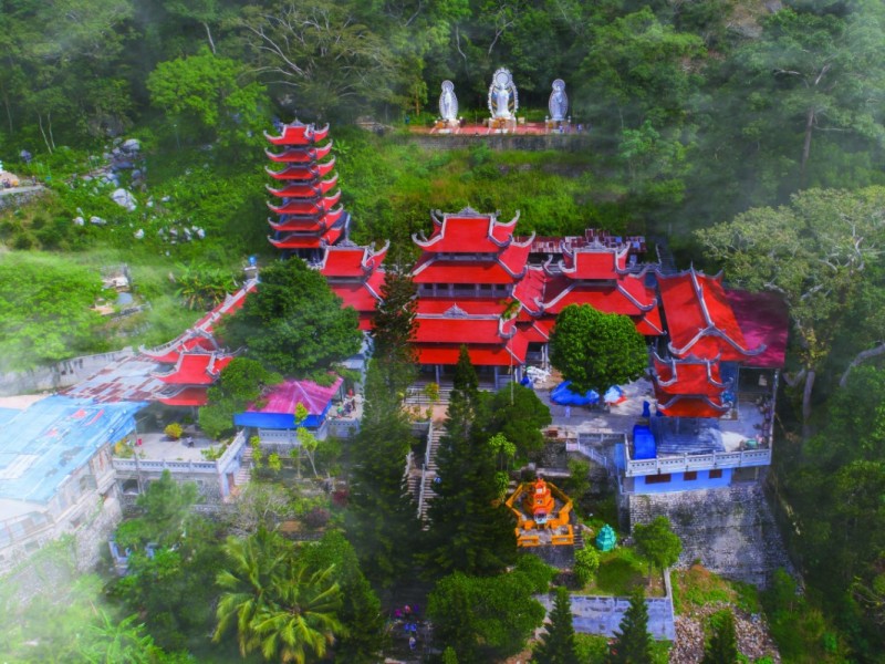 Ta Cu Mountain Pagoda surrounded by lush greenery in Binh Thuan Province