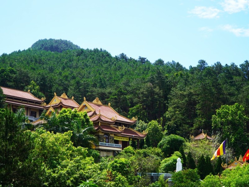 Truc Lam Tay Thien Zen Monastery surrounded by lush green hills in Tam Dao, Vĩnh Phúc