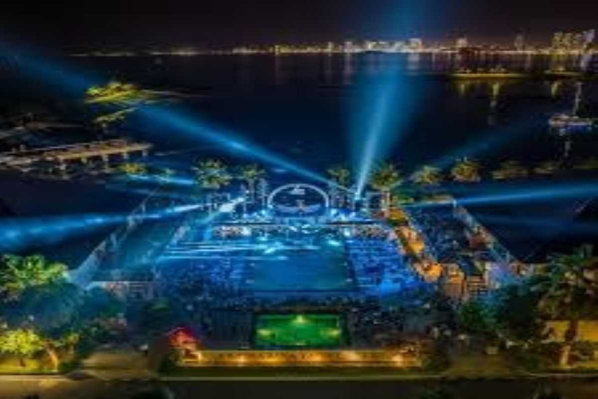 Aerial view of Ambassador Club's night show with full seating and lighting during Nha Trang tour